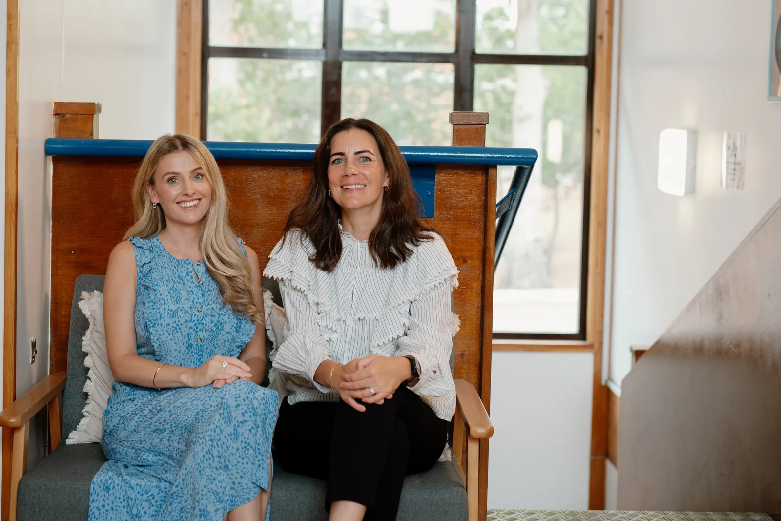 Two members of the London Speech Therapy team seated together.